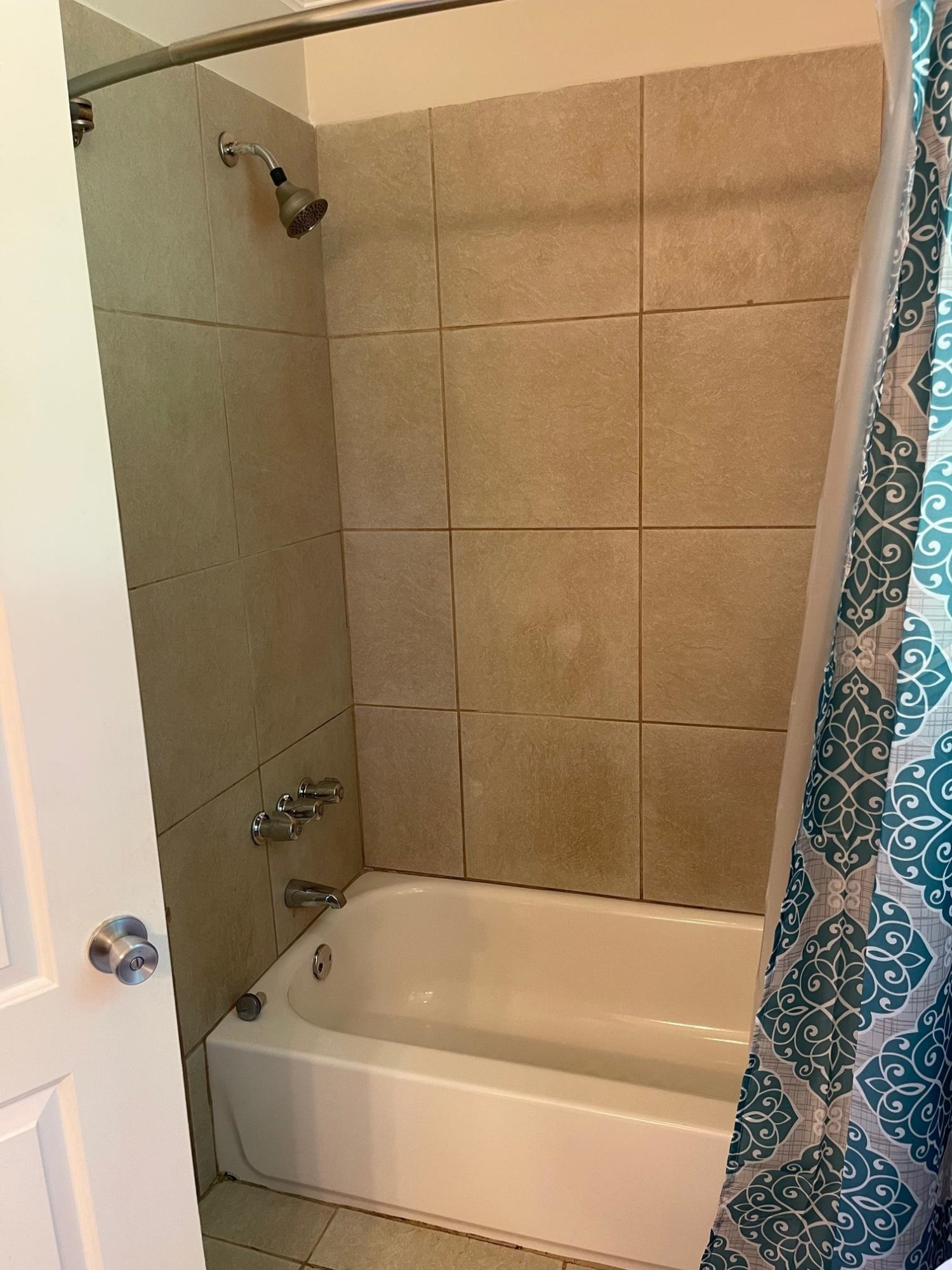 606 Infinity Road Durham, NC 27712 - Photo 14 of 30 a bathroom with a bathtub