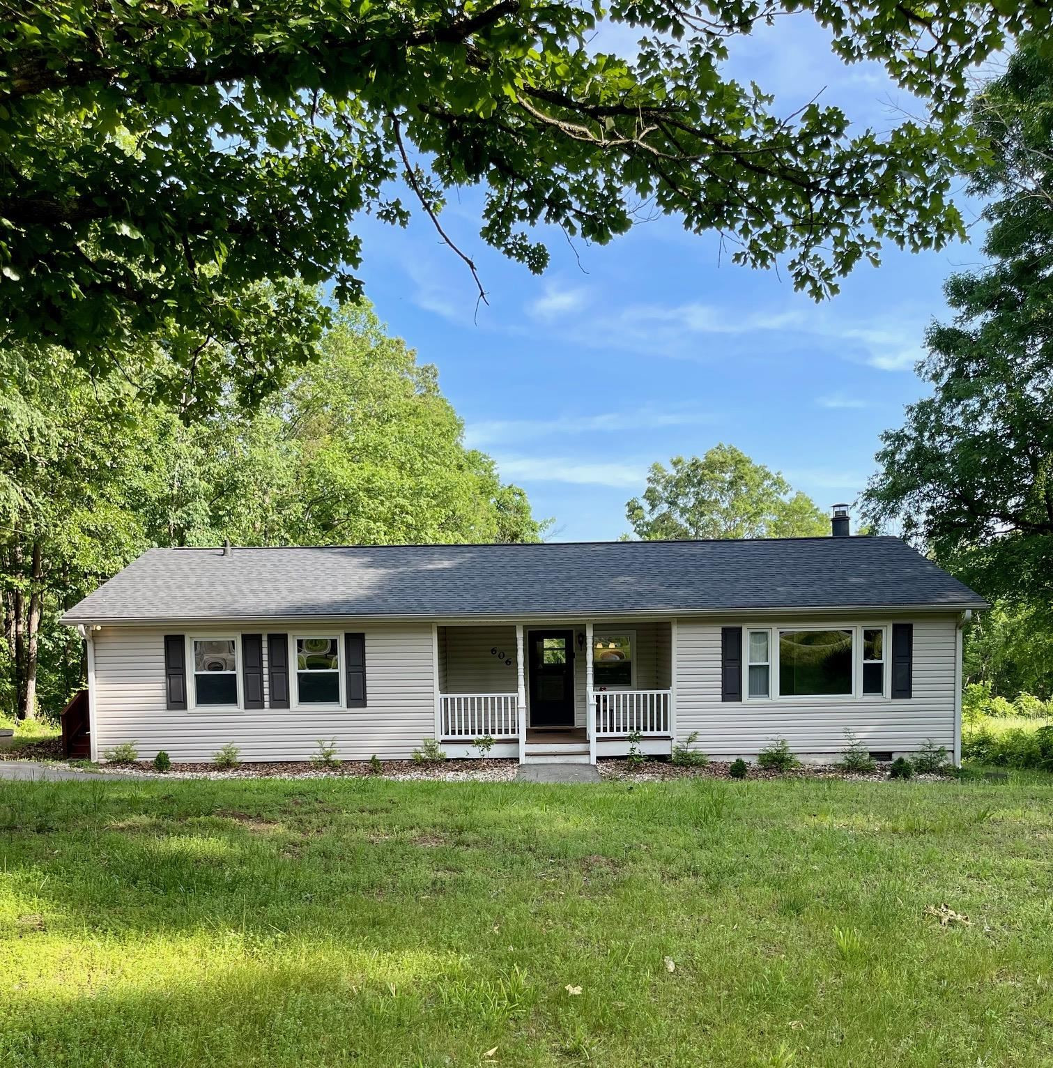 606 Infinity Road Durham, NC 27712 - Photo 29 of 30 a front view of a house with a garden