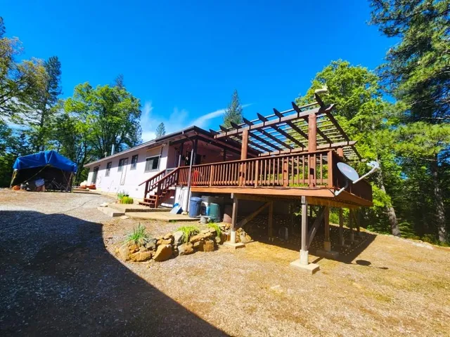 a view of a backyard of a house