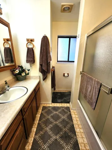 a view of a park with large trees