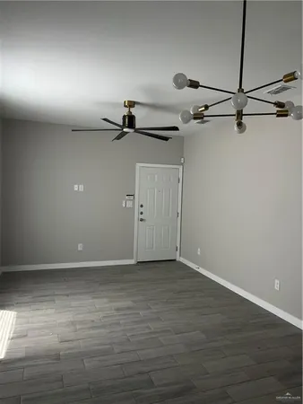 a view of a room with an empty space