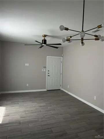 a view of a room with an empty space