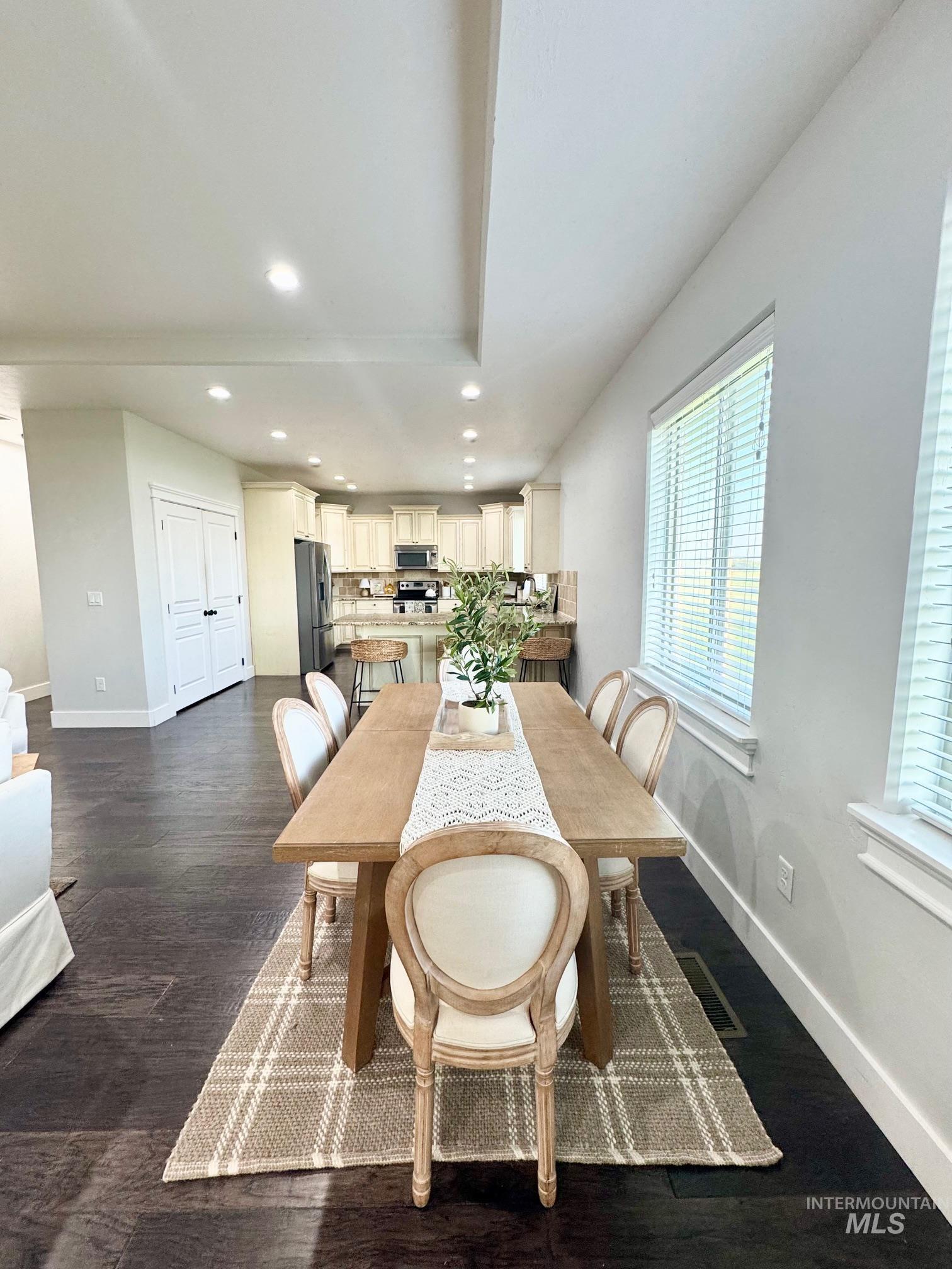 650 Lochsa Loop Heyburn, ID 83336 - Photo 7 of 26 Dining space with recessed lighting and dark wood finished floors