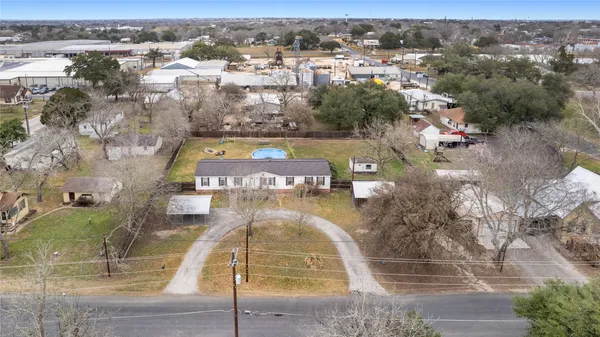 an aerial view of a swimming pool