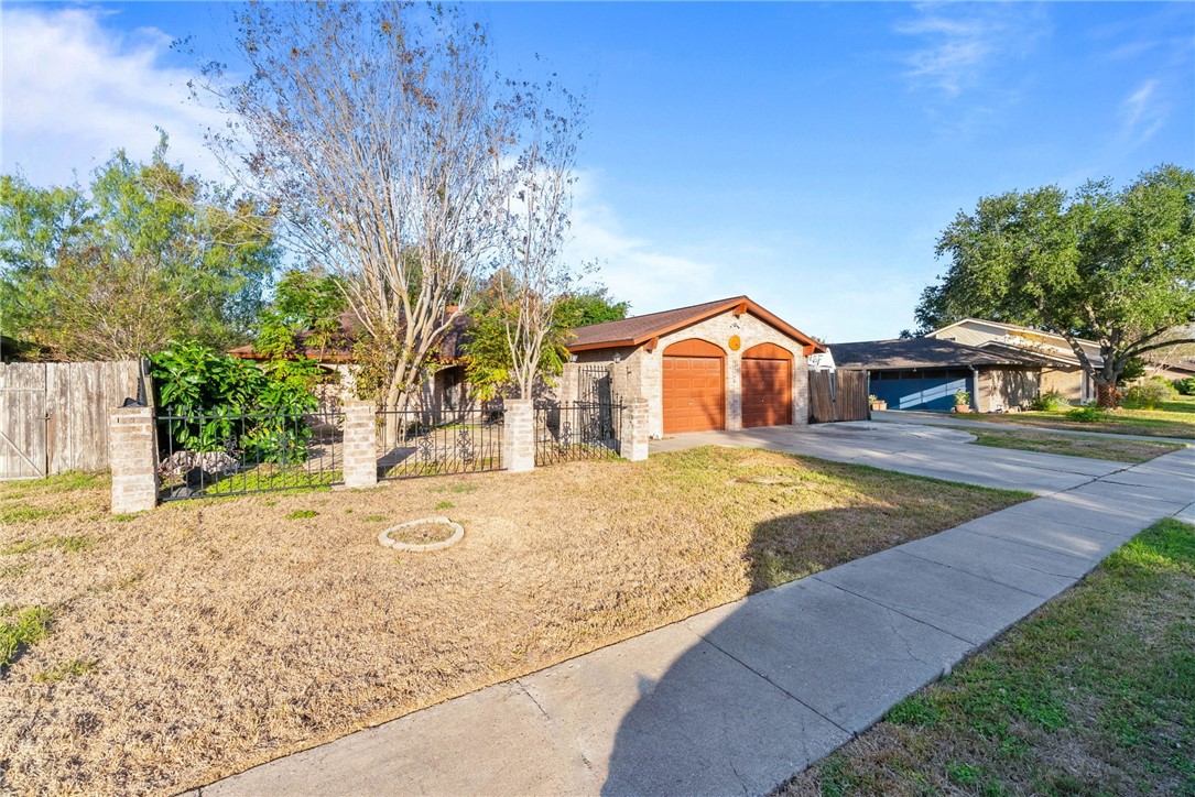 4114 Beard Drive Corpus Christi, TX 78413 - Photo 40 of 40 a house view with wooden fence