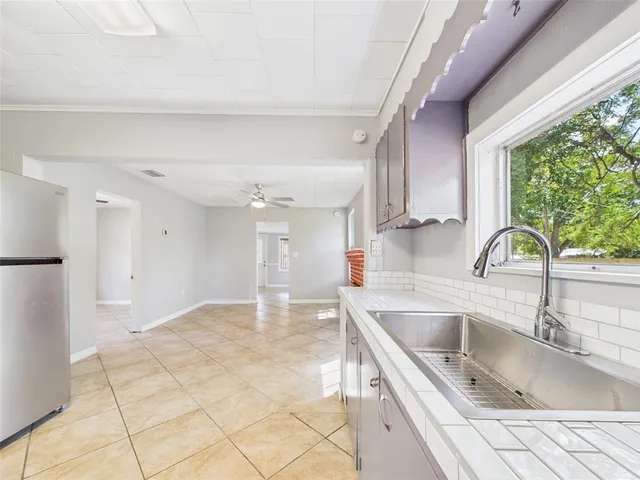 a view of an empty room with a balcony