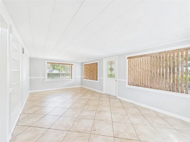 a kitchen with stainless steel appliances a stove a sink and a refrigerator