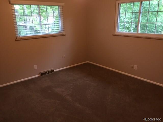 529 West Ridge Road Littleton, CO 80120 - Photo 20 of 21 an empty room with a window