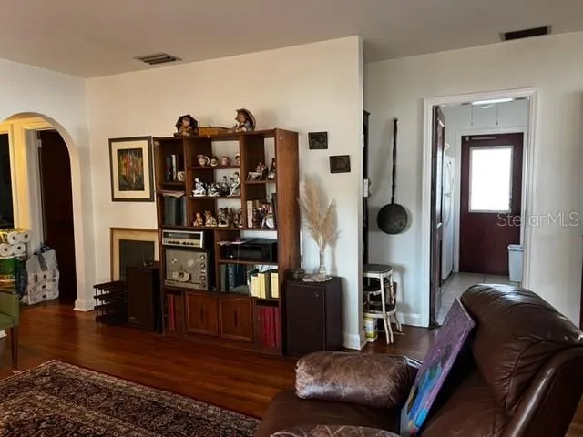 a kitchen with sink and cabinets
