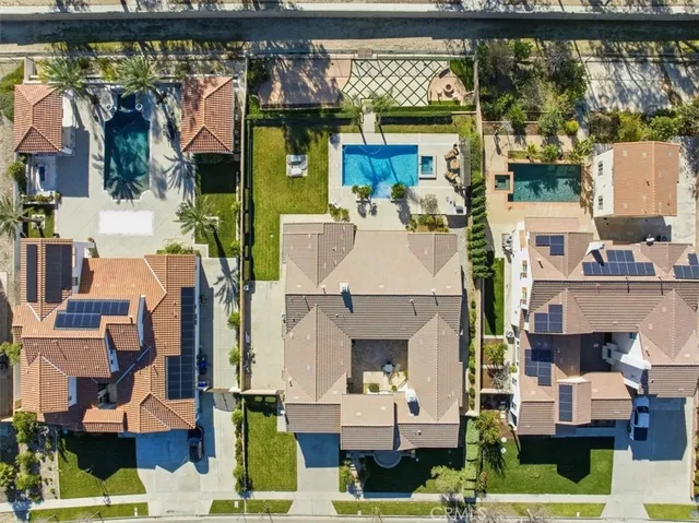 a view of residential houses with outdoor space and river