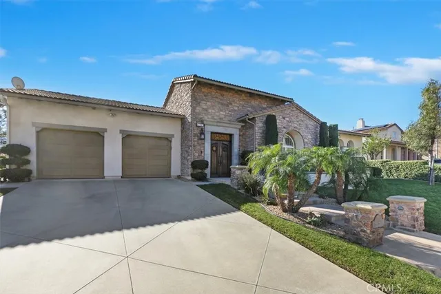 a view of a hallway view with wooden floor and furniture