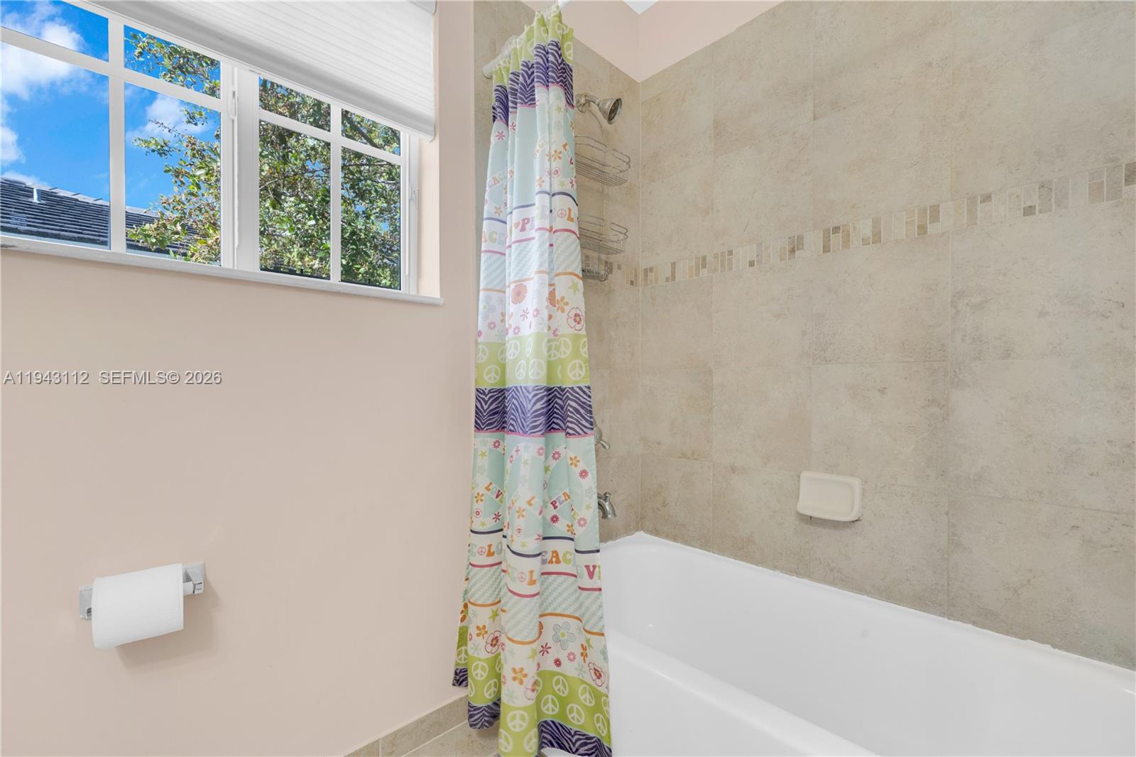 14102 Southwest 276th Street Homestead, FL 33032 - Photo 24 of 36 a bathroom with a bathtub and shower