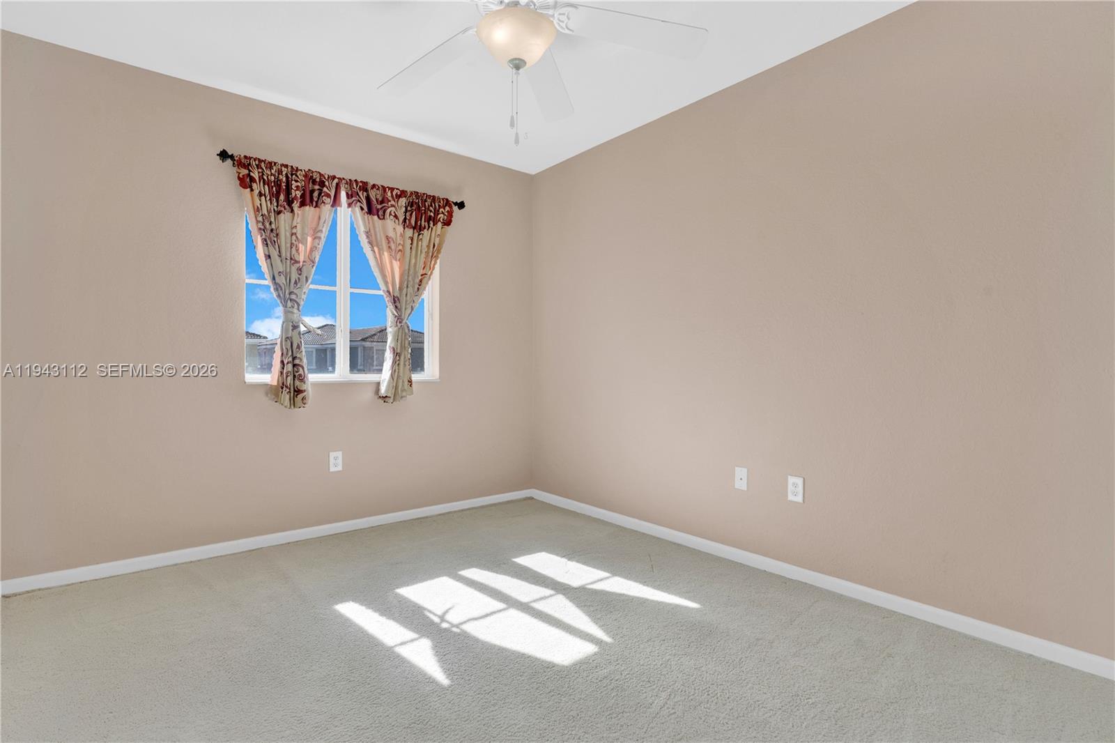 14102 Southwest 276th Street Homestead, FL 33032 - Photo 30 of 36 an empty room with windows
