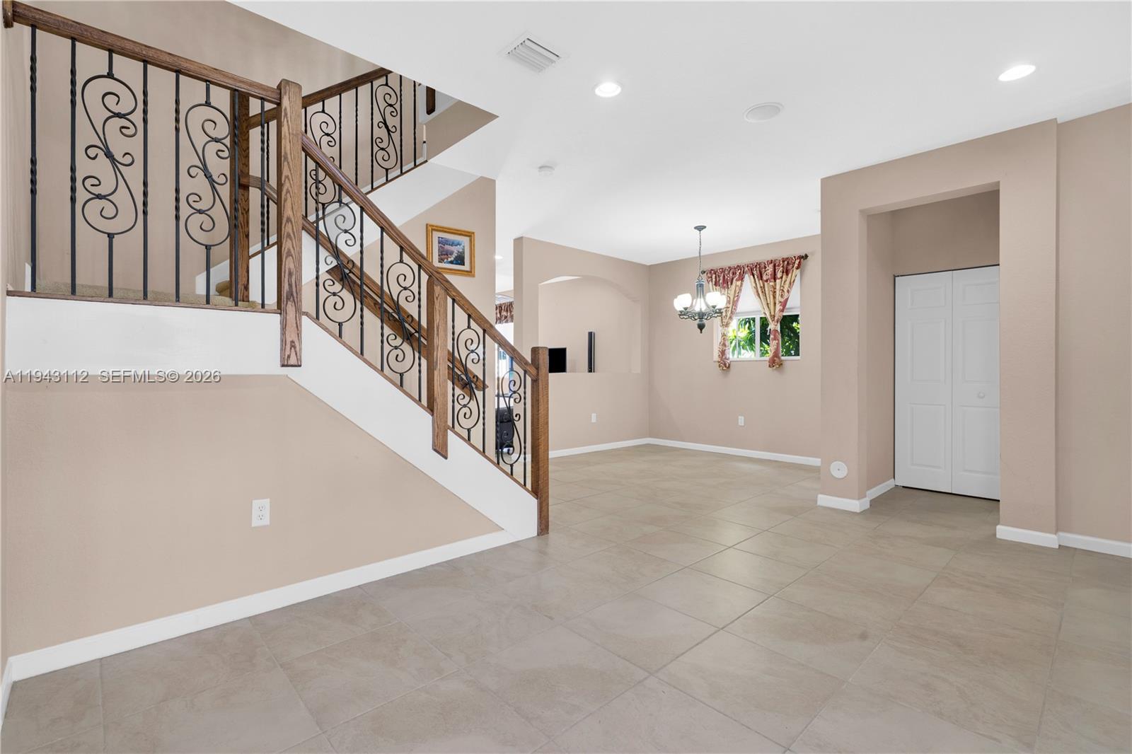 14102 Southwest 276th Street Homestead, FL 33032 - Photo 4 of 36 a view of an entryway with stairs