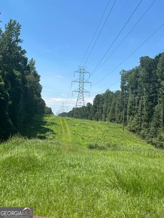 a yard with lots of green space