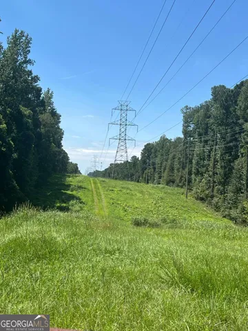 a yard with lots of green space