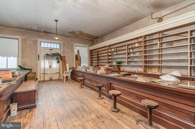 a room with furniture and a large window