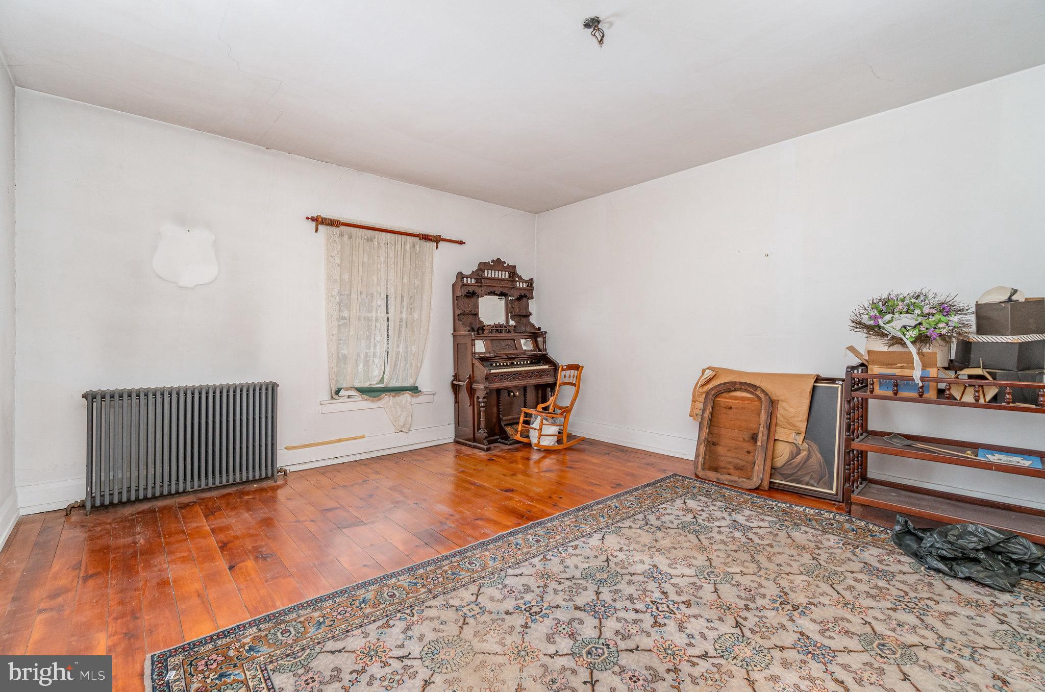 5575 Waggoners Gap Road Landisburg, PA 17040 - Photo 24 of 42 a view of a room with wooden floor and furniture
