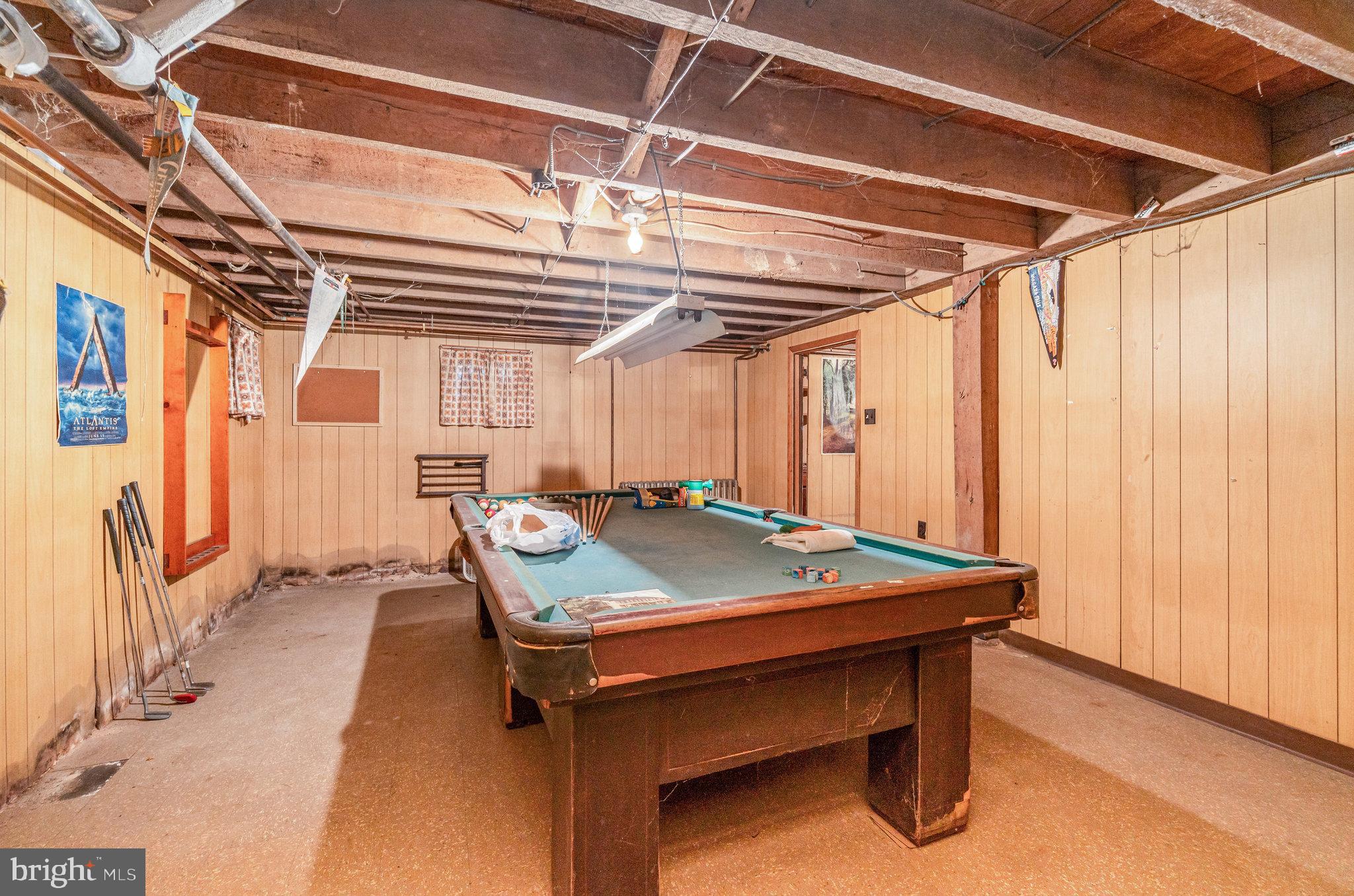 5575 Waggoners Gap Road Landisburg, PA 17040 - Photo 27 of 42 a room with pool table and windows