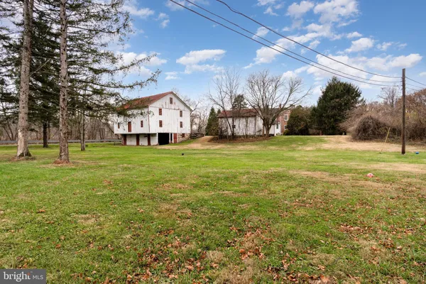 a house view with yard in front of it
