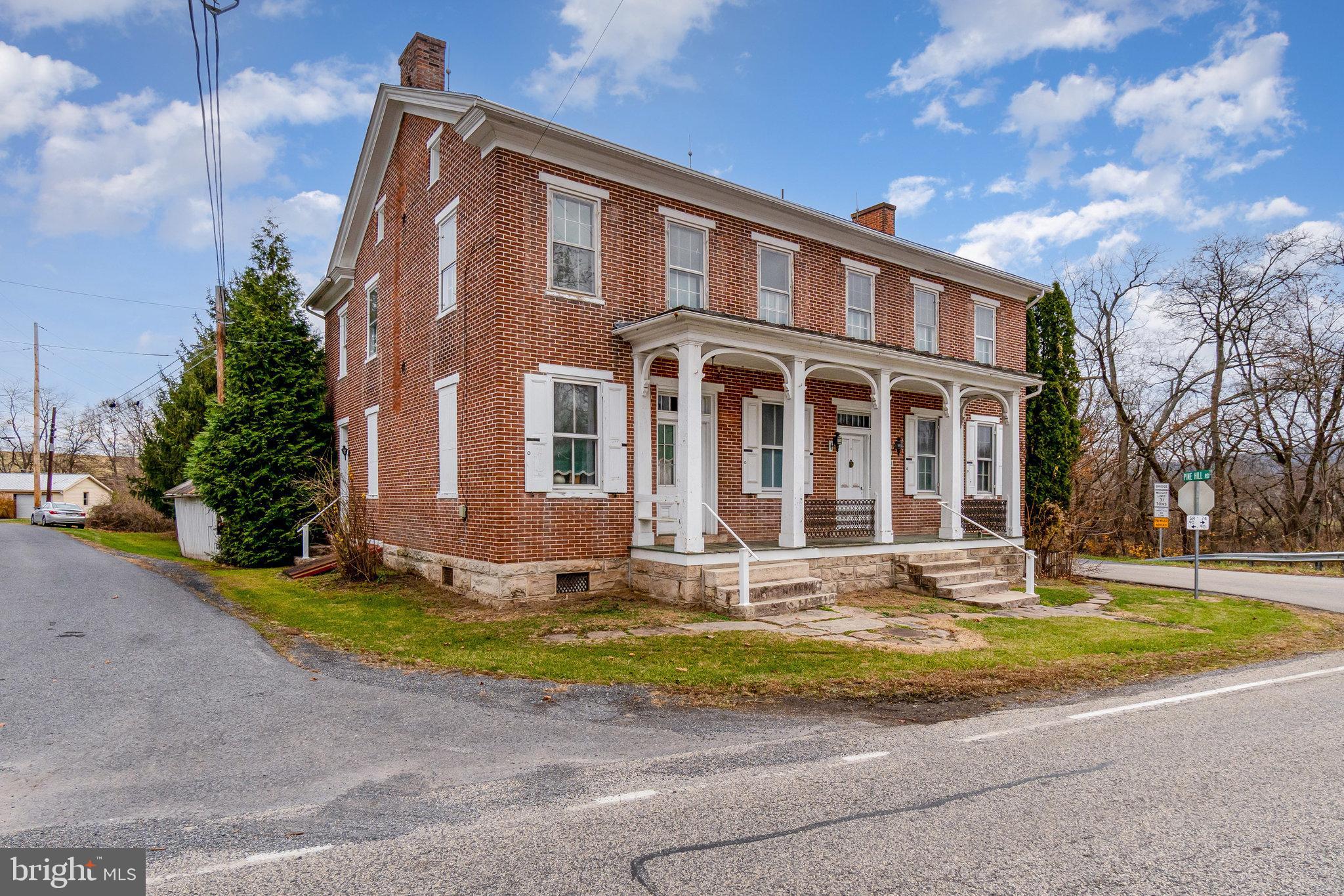 5575 Waggoners Gap Road Landisburg, PA 17040 - Photo 4 of 42 a view of building with yard in front of it