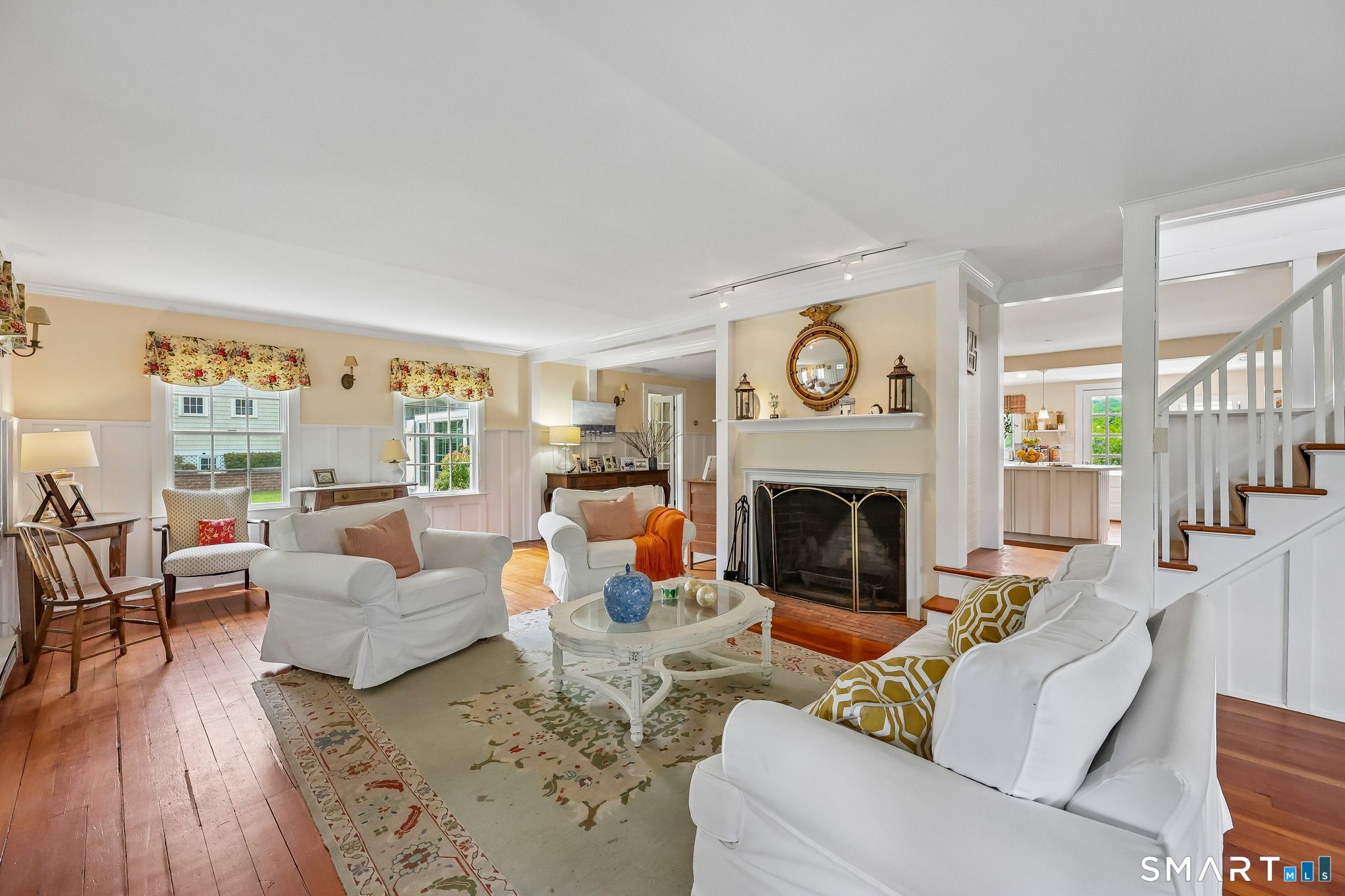 153 Middle Beach Road Madison, CT 06443 - Photo 5 of 40 The sun-drenched living room is 26' by 10' with loads of room to relax