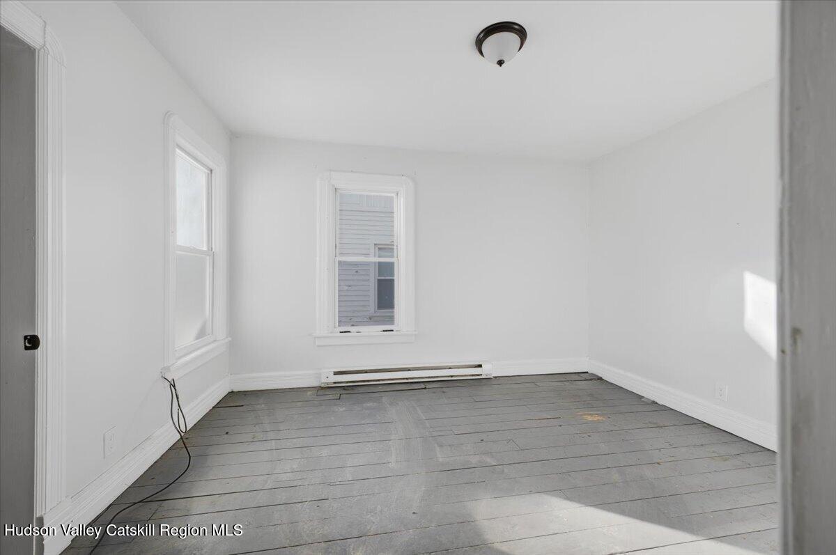 97 Maple Avenue Catskill, NY 12414 - Photo 13 of 27 a view of a room with rack on the wall