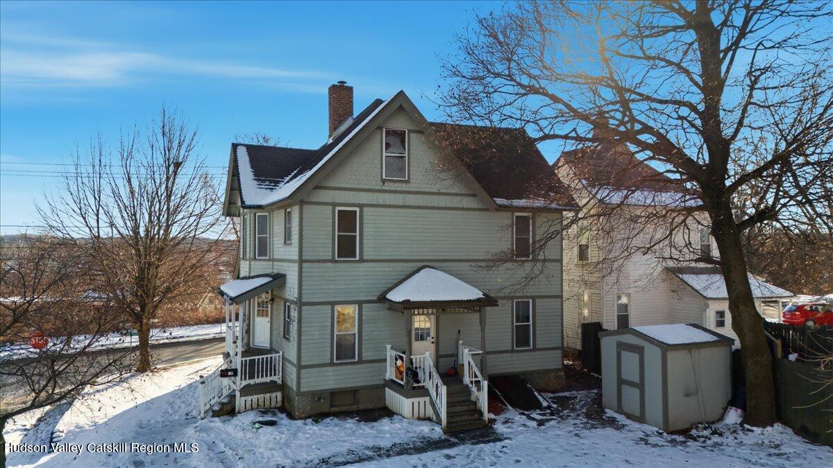 97 Maple Avenue Catskill, NY 12414 - Photo 3 of 27 a view of a house with a yard and roof deck