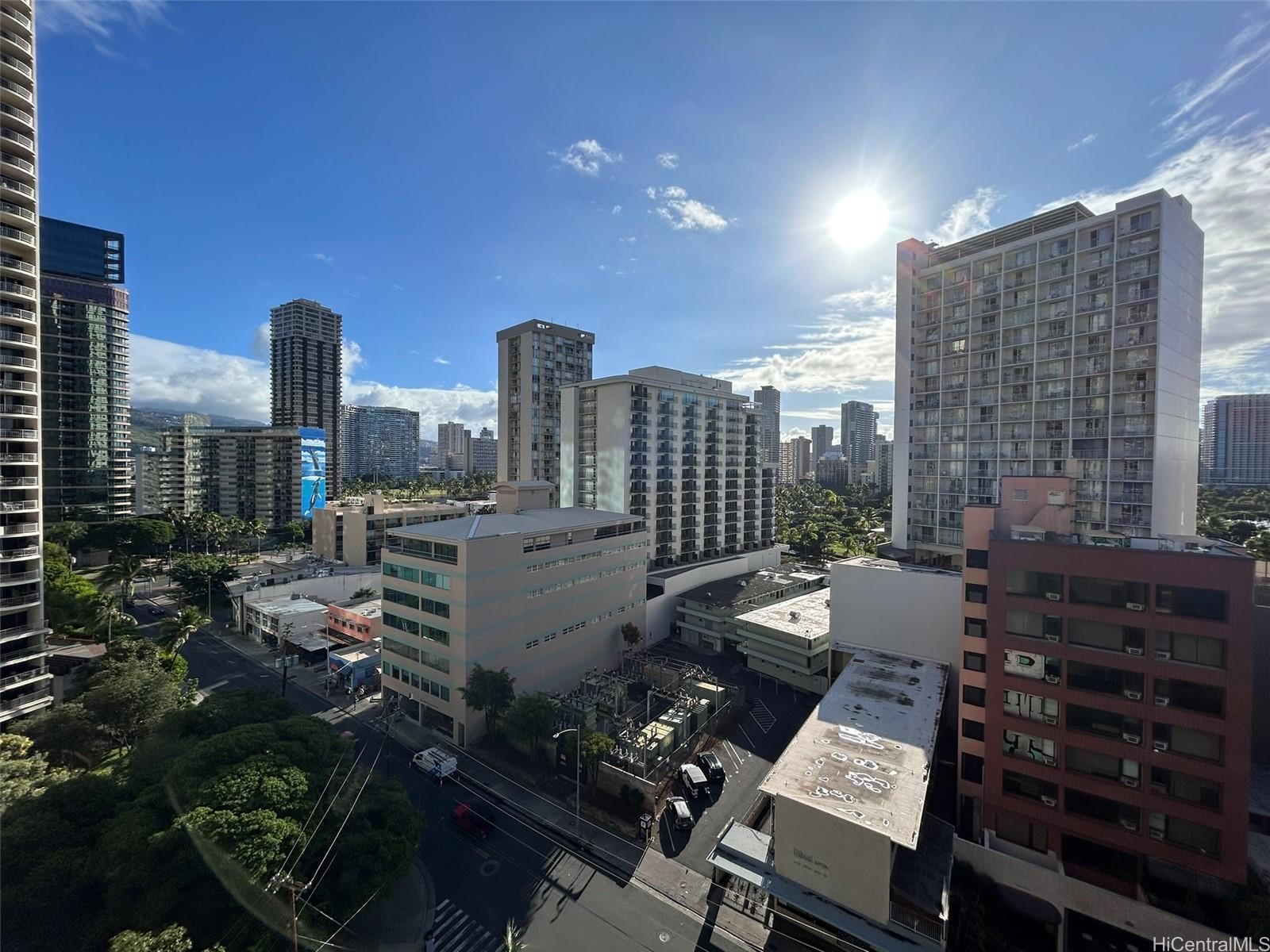 a view of city with tall buildings