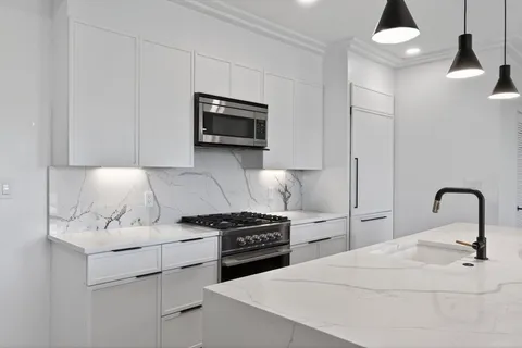 $899,000 | 50-56 Leo M Birmingham Parkway, Unit 302, Boston, MA 02135