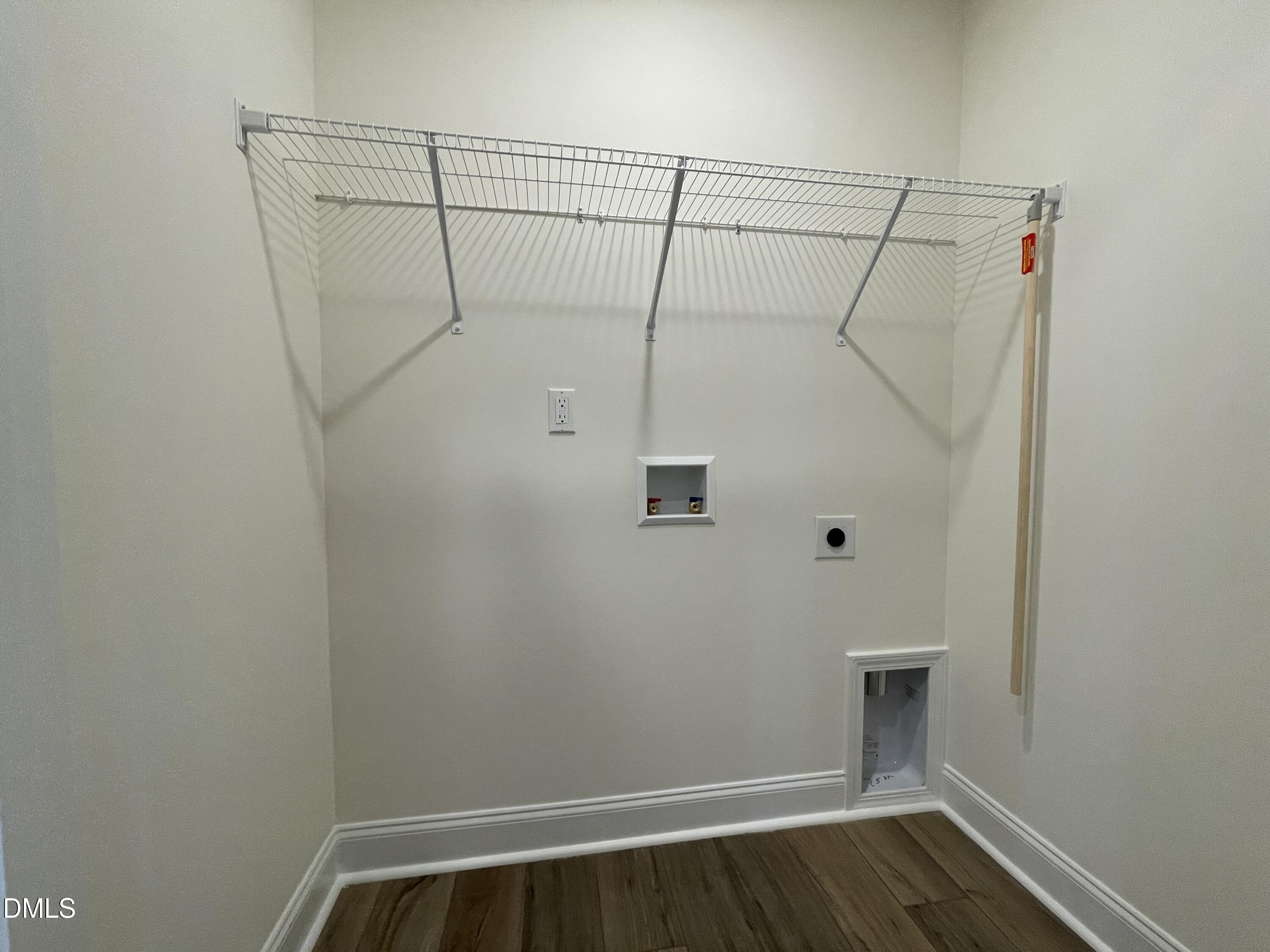 6429 Granite Quarry Drive Raleigh, NC 27610 - Photo 19 of 21 a view of small space with racks on the wall