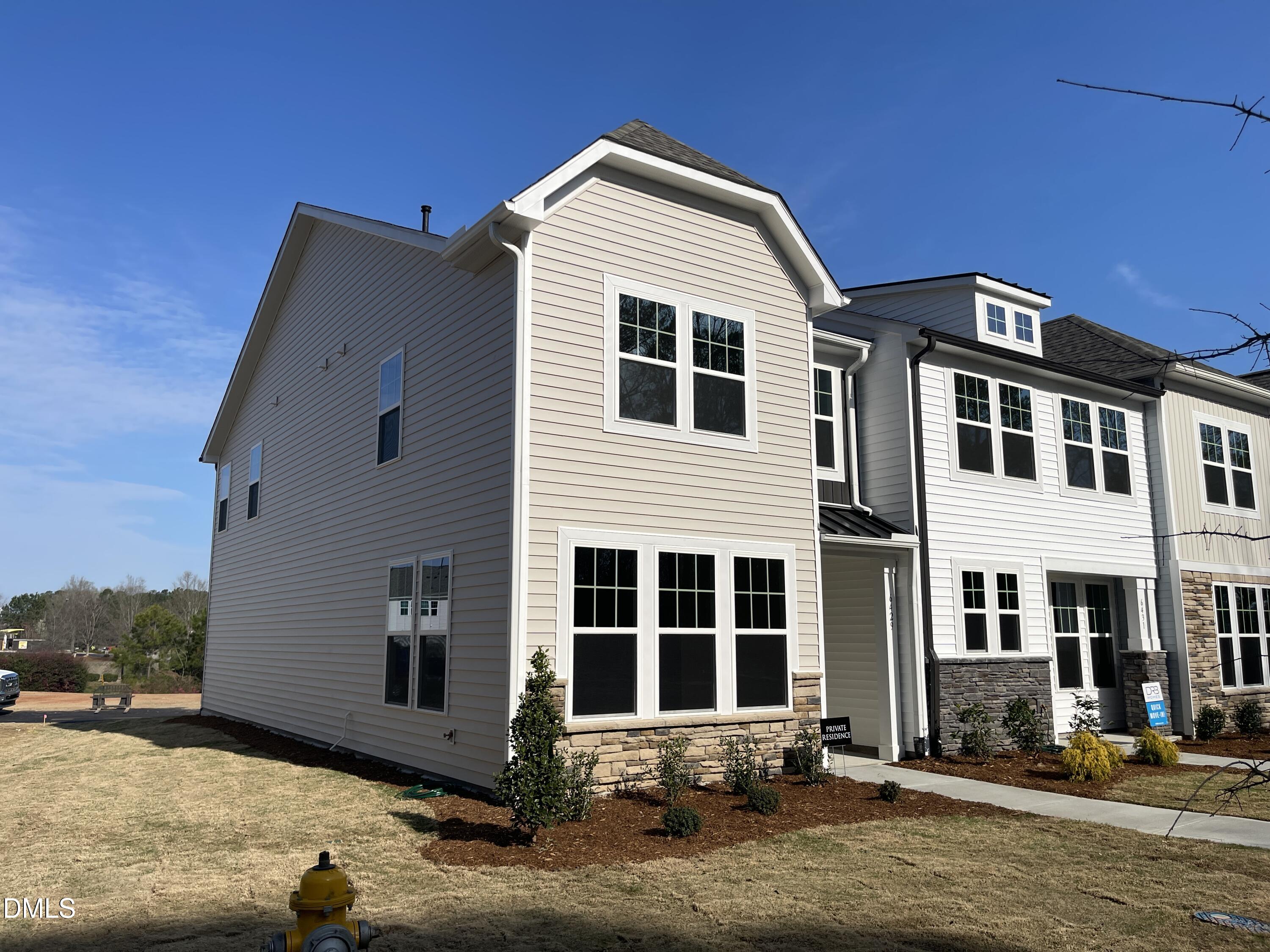 6429 Granite Quarry Drive Raleigh, NC 27610 - Photo 2 of 21 a front view of a house with a yard