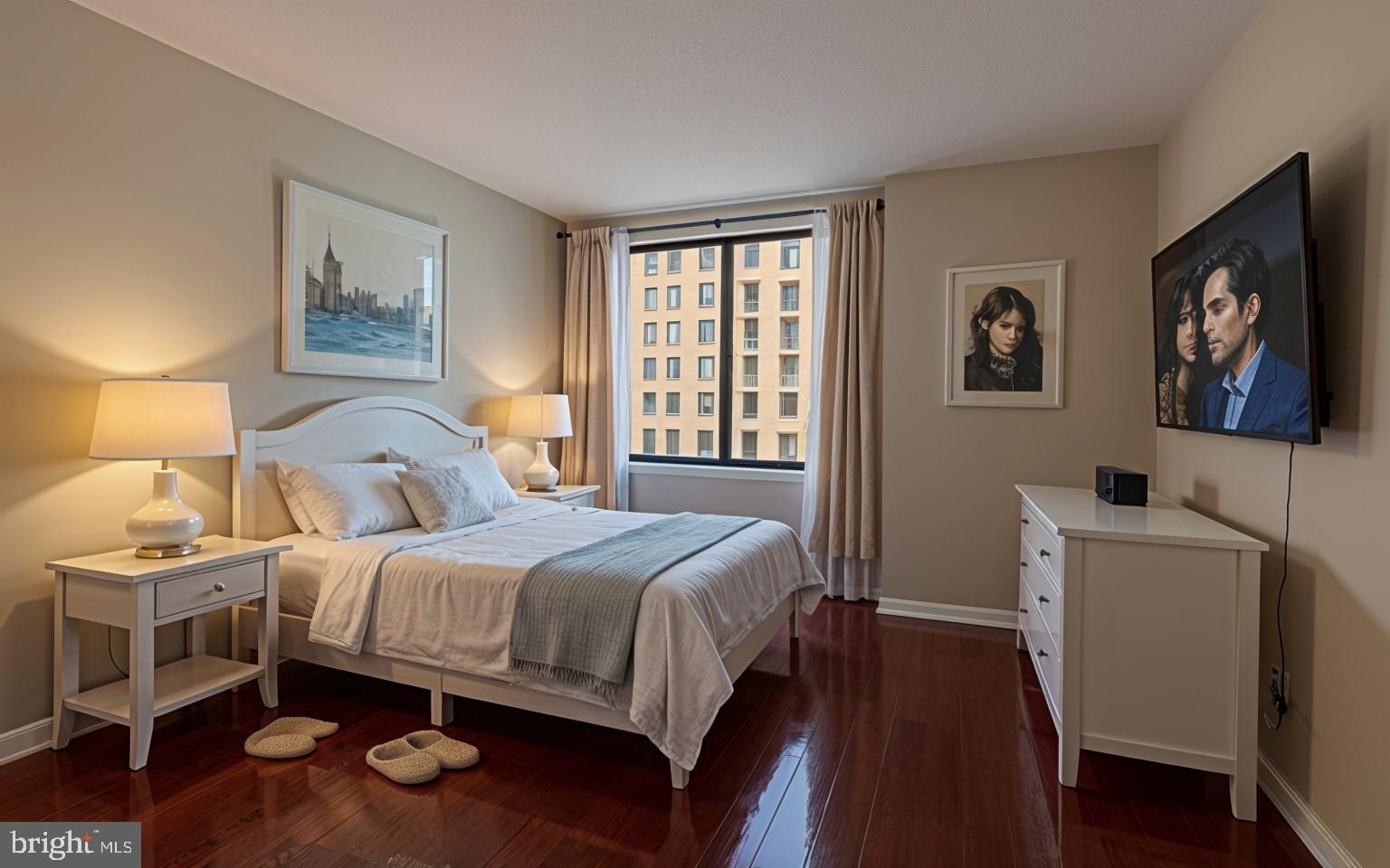 11710 Old Georgetown Road, Unit 1007 North Bethesda, MD 20852 - Photo 17 of 30 a bedroom with a bed and a cabinets
