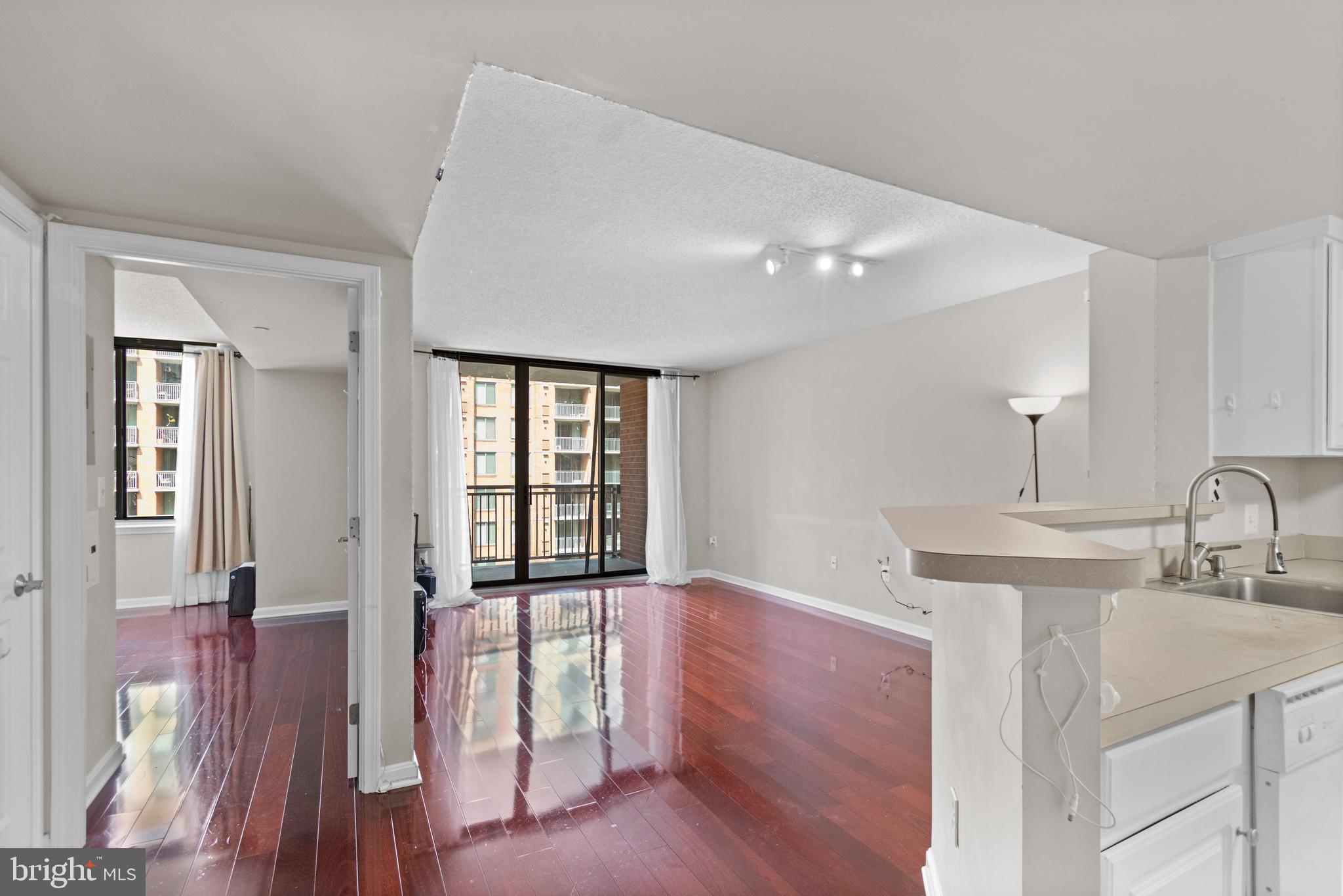 11710 Old Georgetown Road, Unit 1007 North Bethesda, MD 20852 - Photo 19 of 30 a view of a kitchen from the hallway