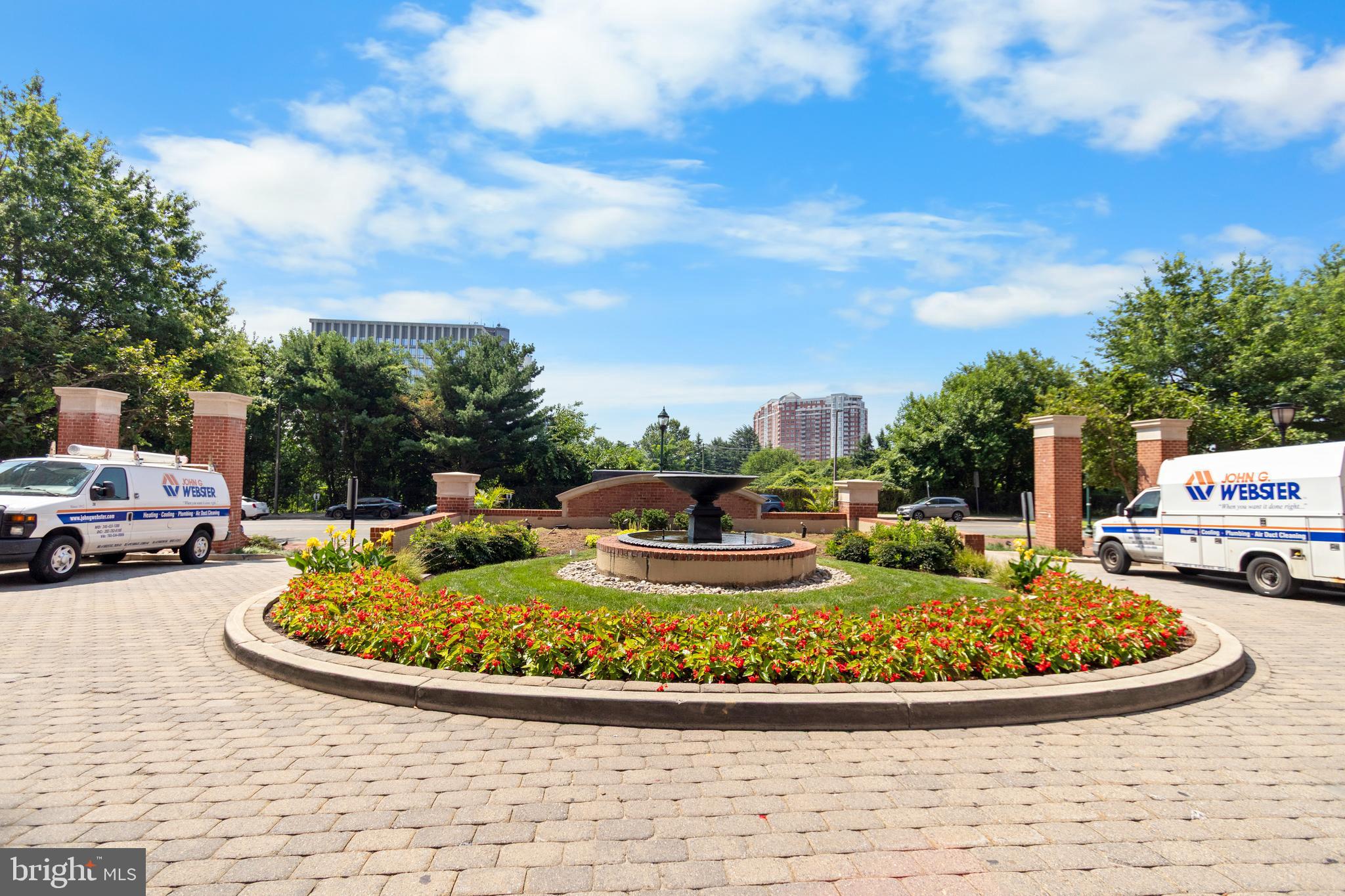 11710 Old Georgetown Road, Unit 1007 North Bethesda, MD 20852 - Photo 2 of 30 a view of a swimming pool with a yard