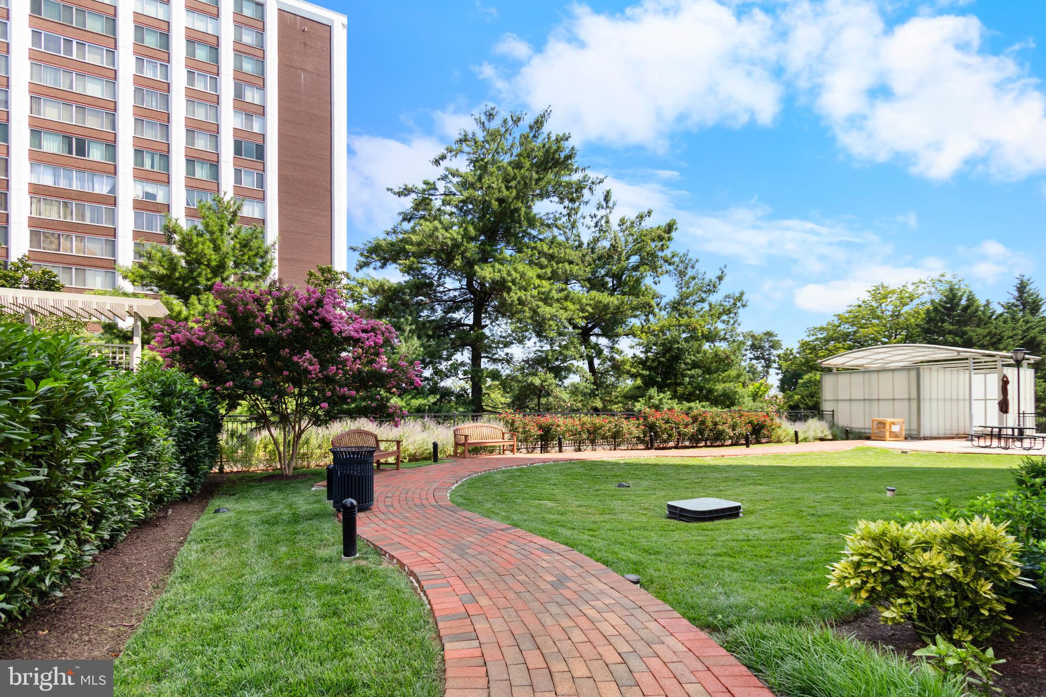 11710 Old Georgetown Road, Unit 1007 North Bethesda, MD 20852 - Photo 28 of 30 a view of a house with a back yard