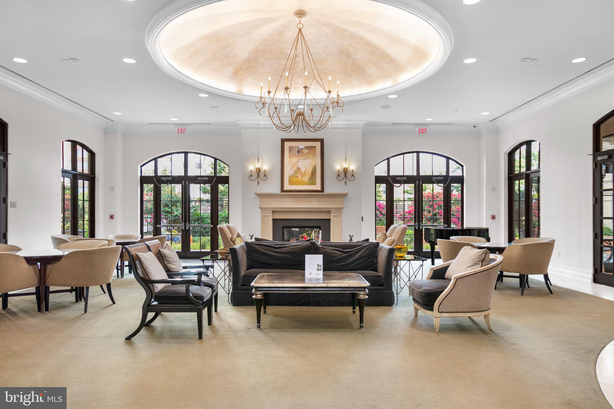11710 Old Georgetown Road, Unit 1007 North Bethesda, MD 20852 - Photo 3 of 30 a living room with furniture and a chandelier