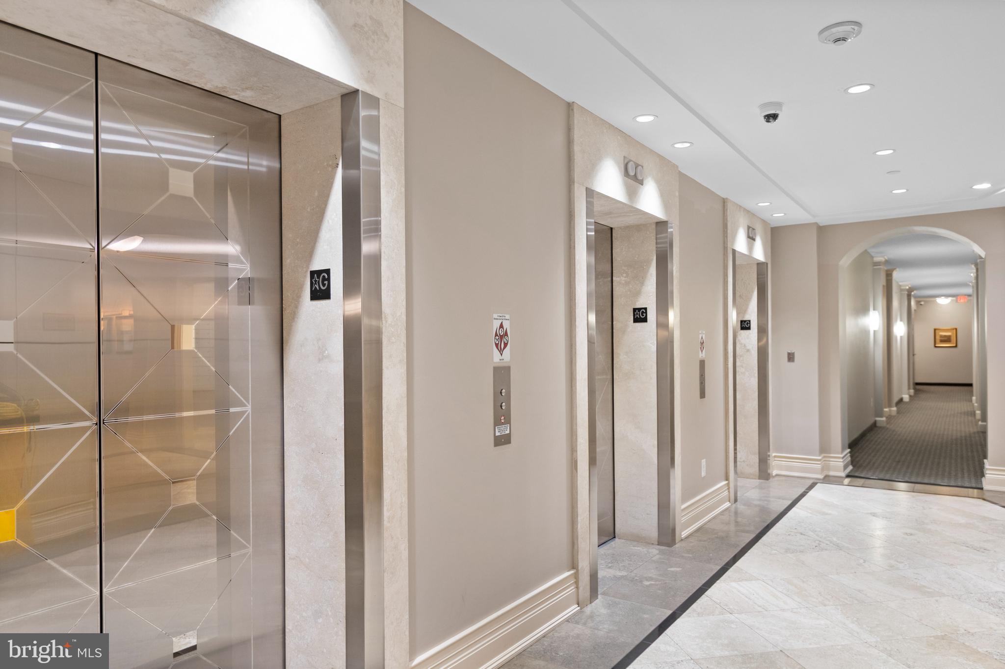 11710 Old Georgetown Road, Unit 1007 North Bethesda, MD 20852 - Photo 8 of 30 a bathroom with a glass shower door