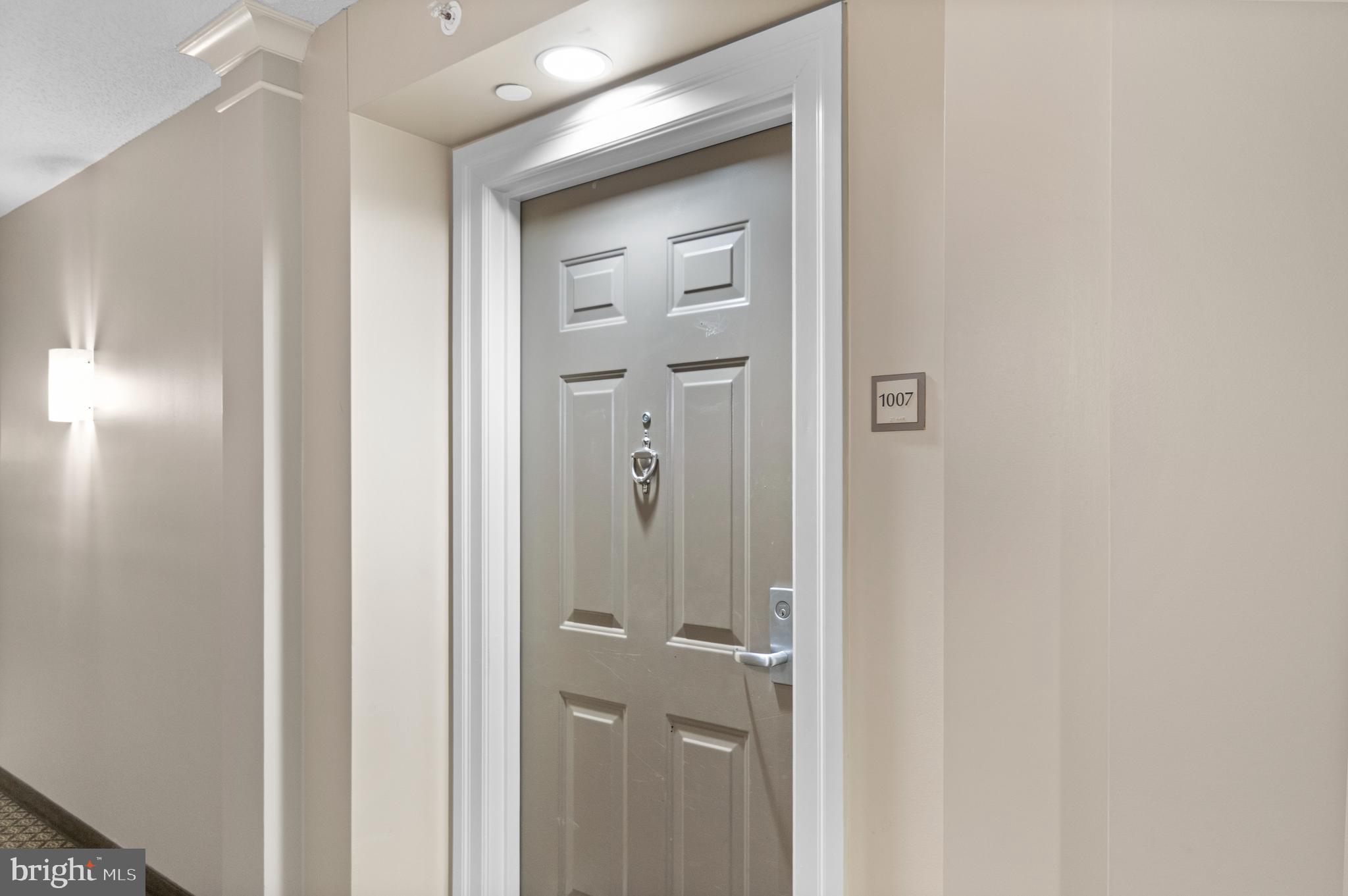 11710 Old Georgetown Road, Unit 1007 North Bethesda, MD 20852 - Photo 9 of 30 a view of a bathroom with a glass door