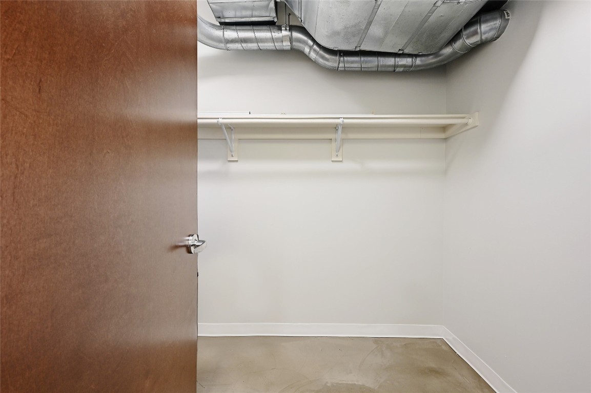 800 Brazos Street, Unit 705 Austin, TX 78701 - Photo 21 of 34 a bathroom with a sink and mirror