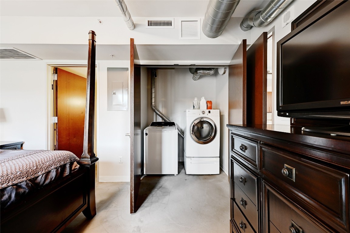 800 Brazos Street, Unit 705 Austin, TX 78701 - Photo 22 of 34 a utility room with dryer and washer