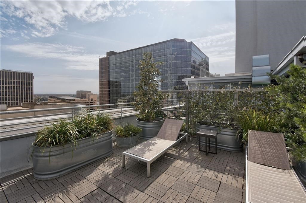 800 Brazos Street, Unit 705 Austin, TX 78701 - Photo 27 of 34 a view of a patio with couple of chairs and a potted plant