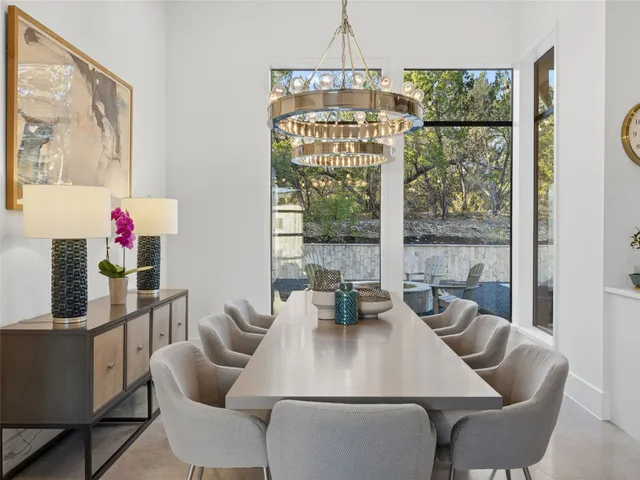 a spacious bedroom with a bed and window