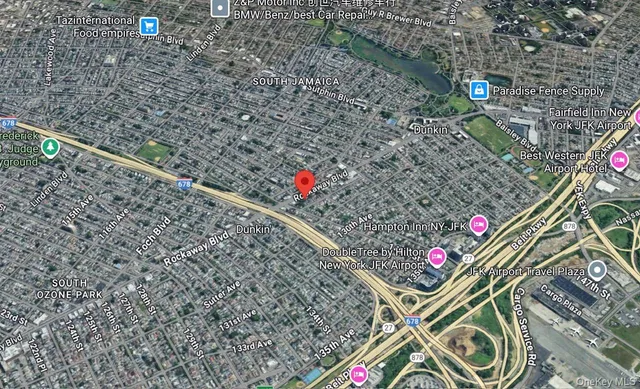 a front view of a building with street view