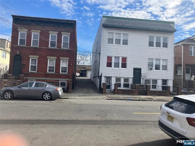 a car parked in front of a building