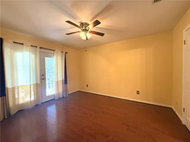 a view of a porch with a tree