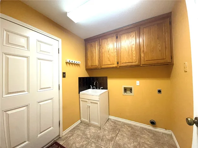 a view of a room with stairs and furniture