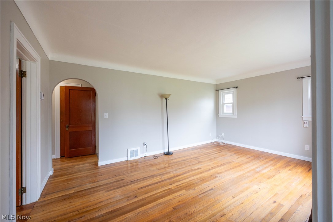 14474 Pease Road Maple Heights, OH 44137 - Photo 11 of 50 Unfurnished room with light hardwood / wood-style floors