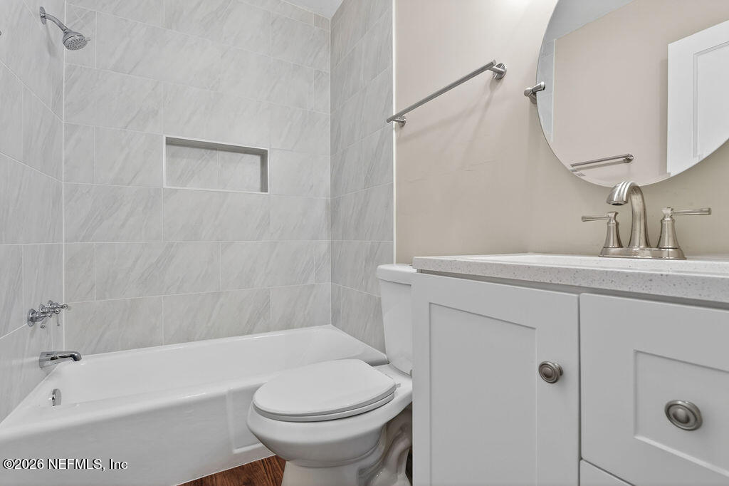 1125 Hamilton Street Jacksonville, FL 32205 - Photo 14 of 19 a bathroom with a sink a toilet and shower