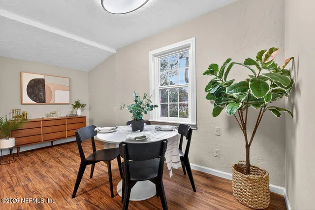 a view of a workspace with furniture